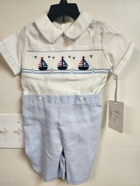  smocked bobby suit features a nautical sailboat motif and blue piping 12m